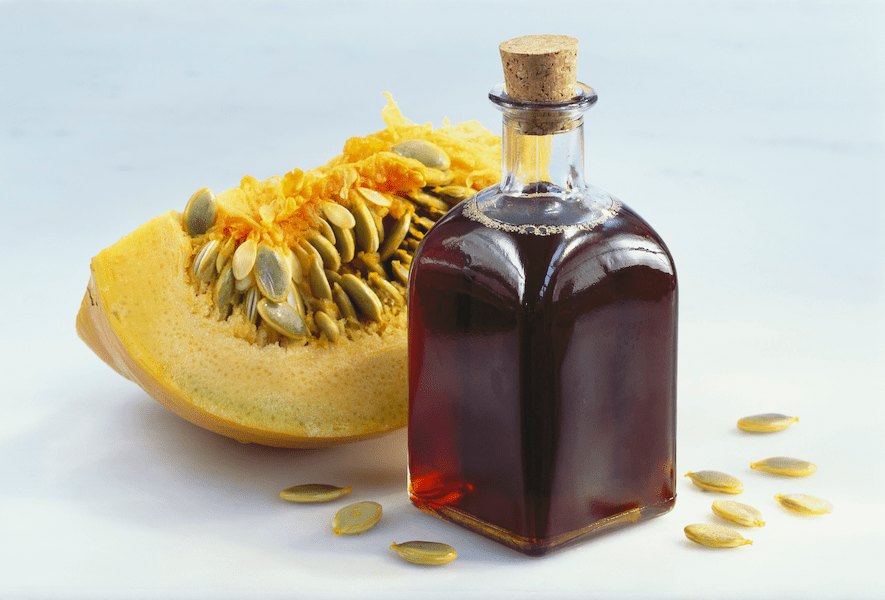 pumpkin-seed-oil-in-bottle-beside-pumpkin--studio-shot-sb10061851ay-001-5ae496e0eb97de0039876a5e