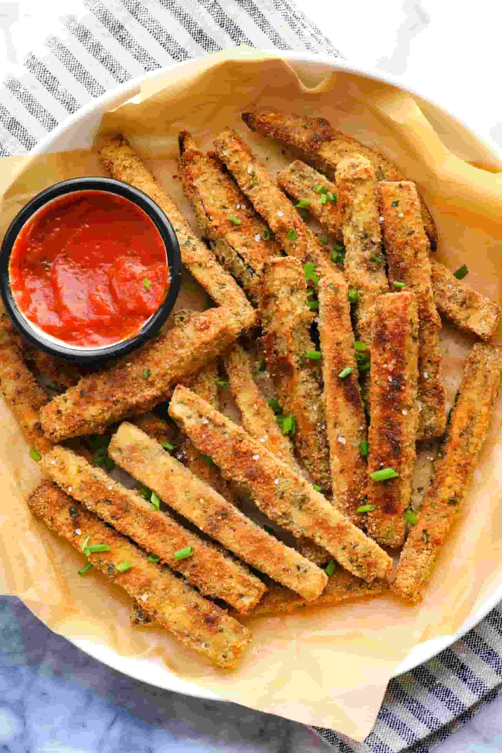 Aerial-view-of-pile-of-baked-eggplant-fries-scaled