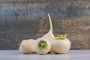 raw-white-turnips-stone-table-high-quality-photo_114579-27104