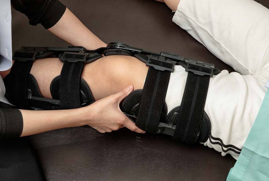 knee-brace-being-fitted