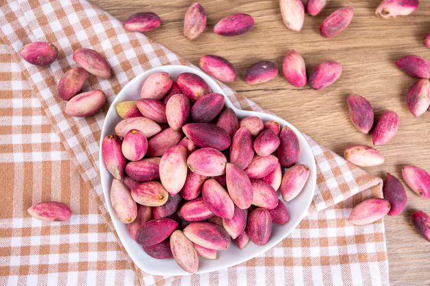 fresh-raw-pistachio-nuts-shell-natural-background-fresh-pistachios-sale-street-market-turkish-known-as-fistik-antepfistigi_693630-2447